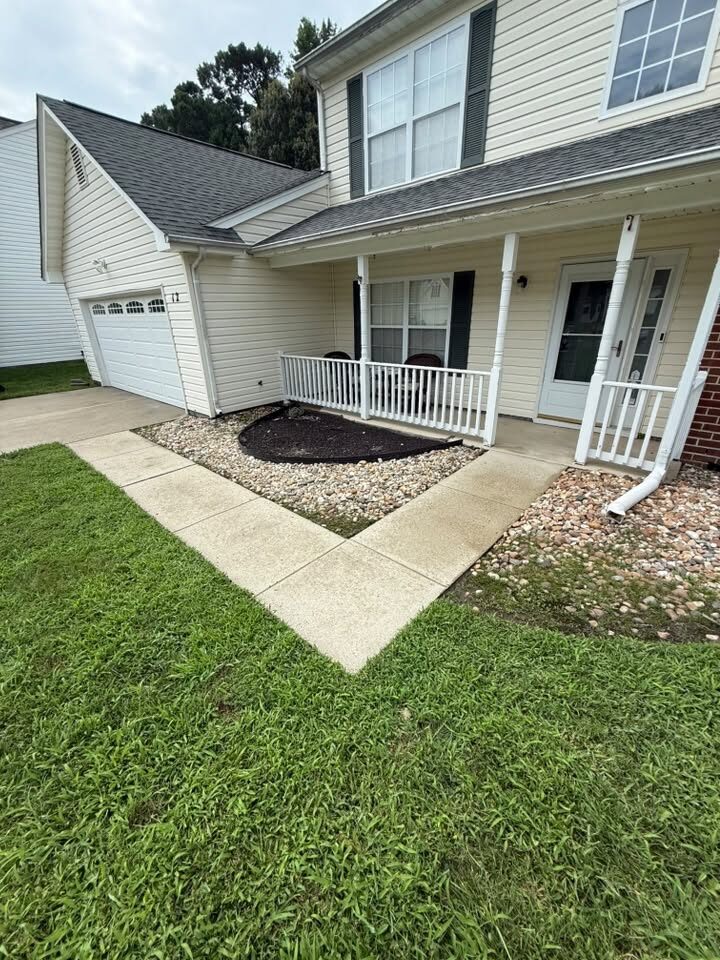 The same walkway after cleaning, the concrete back to a bright even finish