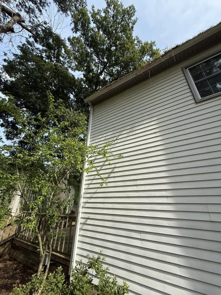 The same siding washed clean and bright