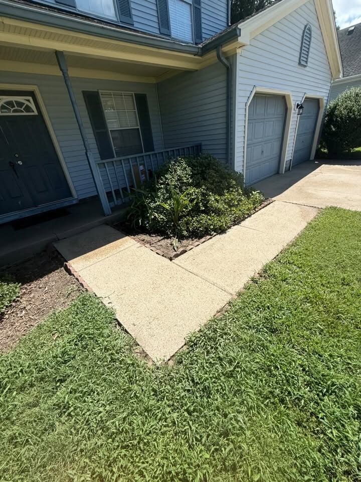The same sidewalk cleaned to a bright pale finish